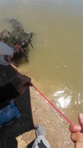 Searching for metal in a river using simple tools