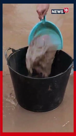 Dozens Of Volunteers Swept Mud Off The Streets And Parking Lots In Catalonia As Cleanup Operations