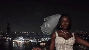 Bride's Veil Blown Off High Rise as She Posed For Photos on Bachelorette Trip