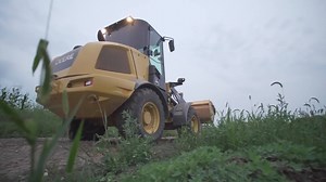 Whether landscaping or on the farm, John Deere helps you reach higher. | John Deere