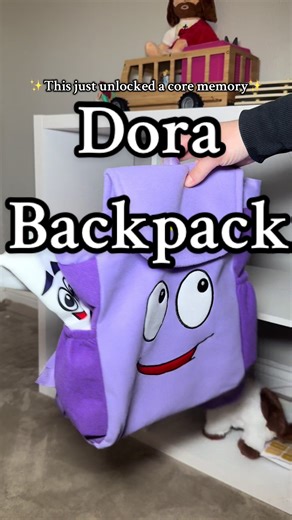 Stop because this is TOO cute 😭🎒 This Dora backpack even comes with the MAP — and it’s a little zipper sack your toddler can put things in 🗺️💜 Perfect size, lightweight, and such a fun everyday or travel bag. #DoraTheExplorer #ToddlerBackpack #ToddlerMom #MomTok #TikTokShopFinds