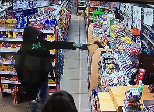 Update: watch video footage of attempted axe robbery