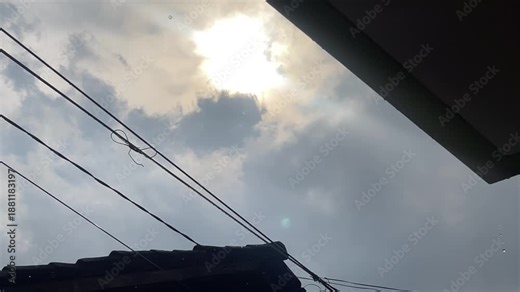 Light Rain Drizzle Falling on Wet Surface