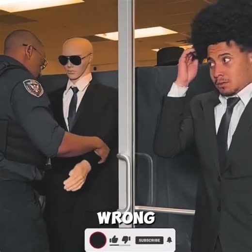 Man Escapes Into Display Case, Guard Steals Model's Accessories For Himself