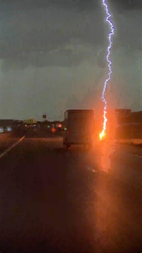 Lightning bolt nearly hits truck on Utah interstate