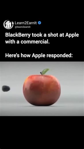 BUSINESS | SUCCESS | MONEY on Instagram: "Before the iPhone took over, smartphone ads were a battlefield. BlackBerry launched an aggressive commercial showing a blackberry fruit shooting through an apple, symbolizing its power and focus on business users. Apple quickly clapped back with a clever response. In their version, the blackberry hits the apple but simply bounces off, highlighting Apple’s strength and staying power. These ads reflected a defining rivalry in the early days of smartphones,