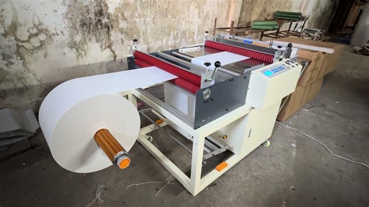 Non woven fabric cutting machine, converting cutter from roll to sheet #cuttingmachine #nonwoven #medical #rolltosheetcuttingmachine #unwinding