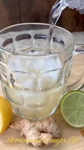 To make homemade ginger ale, start by peeling and grating or thinly slicing about one cup of fresh ginger. Add the ginger and one cup of water to a saucepan, bring it to a boil, then reduce the heat and let it simmer for 10 to15 minutes to extract the flavor. Strain out the ginger and return the liquid to the pan, then stir in ¾ to 1 cup of sugar or honey (I used monk fruit )until fully dissolved, creating a ginger syrup. Allow the syrup to cool, then to serve, fill a glass with ice, add two to 