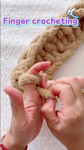 Knit scarf with fingers