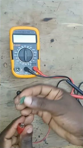 Testing a thermistor with a multimeter.