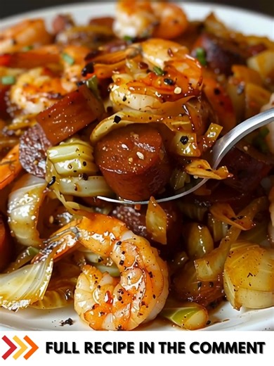 FRIED CABBAGE WITH SHRIMP, SAUSAGE & BACON RECIPE Ingredients: 5 slices of bacon, chopped 1/2 cup yellow onions, chopped 3 cups cabbage, cut in thin strips 10-12 shrimp, tail off & deveined 1 link of kielbasa or smoked sausage, cut 1/2 in 1 tbsp olive oil ........ Full Recipe in Coʍmеոτ 💬 | Cook By Book