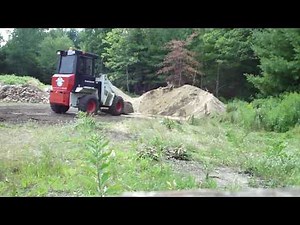 2410 pushing up fill pile