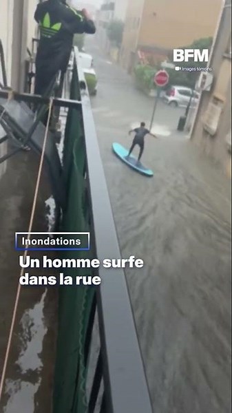 Inondations dans l'Hérault: un homme filmé en train de surfer dans la rue