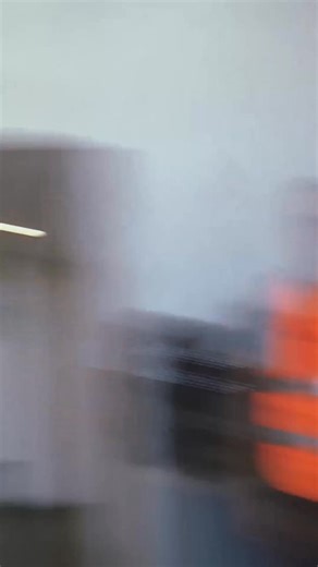 What’s the most unexpected place you'd take a camcorder? We took one on a little warehouse trip 📼 Pallets, warehouse robots and pure logistics cinema 📦🎞️ | DHL