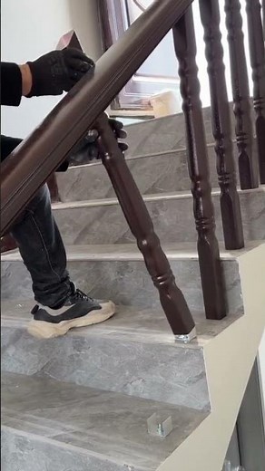 the process of installing handrail supports on stairs