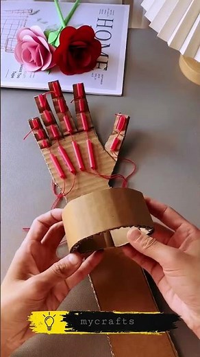 Build your own robotic hand using just cardboard, straws, and string! 🤖✋