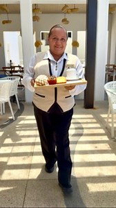 Pan dulce incoming! 🍞✨ Jessica’s on a sweet mission… but she needs your help! 💬 Tap the circle to help her bring the pan dulce faster—your morning treat is on the line! #SecretsPuertoLosCabos" | Secrets Puerto Los Cabos Golf & Spa Resort