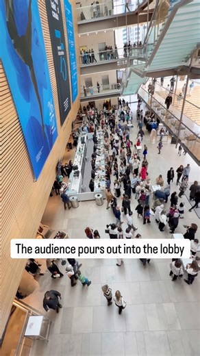The audience pours out into the lobby Seeking refreshments and conversation In the intermission