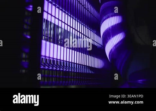 Ultraviolet insect killer device operating with purple light tubes that attract mosquitoes into electric grid trap helping reduce flying pests inside homes during summer season Stock Video Footage - Alamy