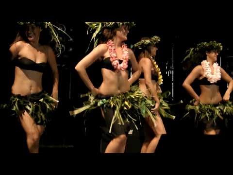 Tahitian Show in Tahiti - girl almosts shakes her skirt off!