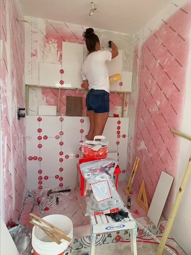 You can do it! 💪🏻 Get yourself a prefabricated shower pan and curb, waterproof the walls, and start tiling!