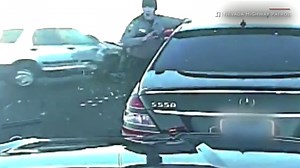 Video captures Nevada officer narrowly avoid being struck by vehicle