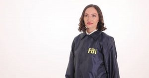 Smiling FBI Agent in Uniform Jacket Turns Around on White Stock Video - Video of detective, officer: 344885031