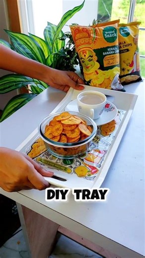 Mansi Verma on Instagram: "DIY Doolde Tray with Beyond Snack Packets 😋 @beyondsnacks #tea #teatime #snack #eveningsnack #chai #nashta #yummy #art #tray #diy #diytray #craft #resinart #doodle #doodleart #artist #doodling #beyondsnack #keralabananachips #24carattaste"