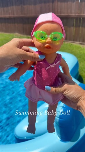 Megan Brown on Instagram: "If you know Emmie you know this is her new favorite thing ever. Follow me + comment “BABY” for the link to her new baby doll that swims on her tummy and on her back, perfect for the pool OR bath  - - - - - - #momfinds #mommusthaves #mom #girlmom #toddlermom"