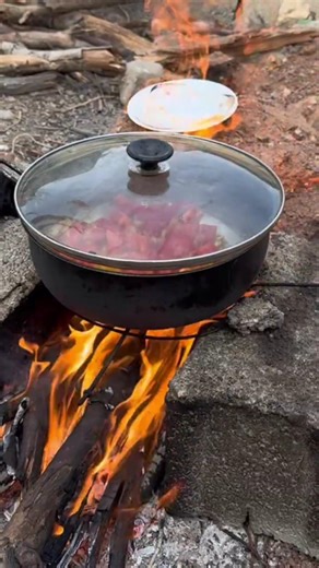 cooking over fire and cooking local food in village life