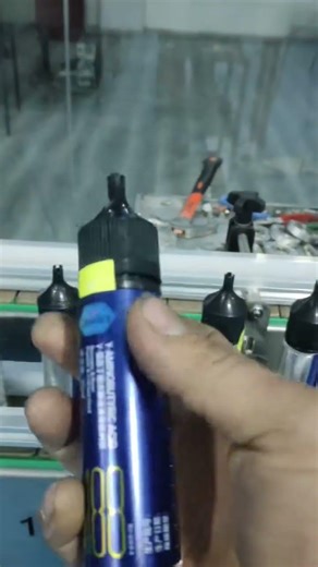 Rotary tax stamp label applicator with bottle labeling machines Poland #machinery #labelmachine