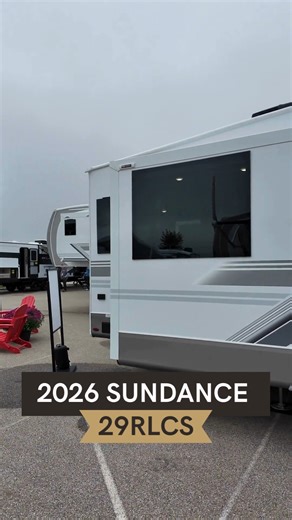 The 2026 Sundance 29RLCS - where cutting-edge technology meets refined comfort. This model comes equipped with little luxuries, from the 4K ultra LED Smart entertainment system, to the Olympic-sized bed and residential vinyl flooring. 😌 See more of the 2026 Sundance lineup here. https://bit.ly/493UmGU | Heartland RVs