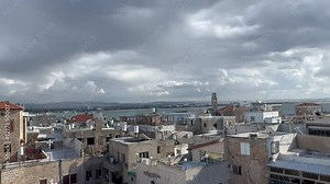Akko, Israel, January 20, 2025. A sight of the historic city and St. George’s Greek Orthodox Cathedral. The roof of the church features a white cross design.