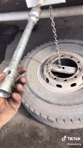 How to Secure a Tire with a Chain and Metal Rod
