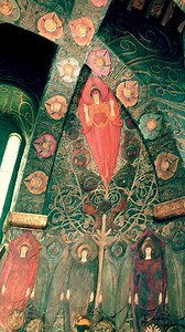 'Chapel Of Winged Messengers & Seraphs' "A heaven full of symbols of the planets, the sun and moon, there are winged spirits, and knights, a version of Watt’s painting The All-Pervading, all interlaced with and linked by Celtic scrolls." "The breathtaking vision that meets the eyes inside is one of the greatest sights of European Art Nouveau. Standing in the centre, one is surrounded by a host of angels and cherubs, which soar around one’s head in reds, gold and blue-greens, wrapped by never-end