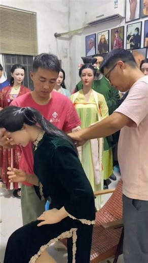 A wax sculptor's daily work: adjusting and fixing the head of a wax figure.