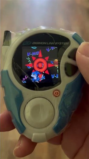 V-mon evolution to Flamedramon. Digivice D 3 25th color.