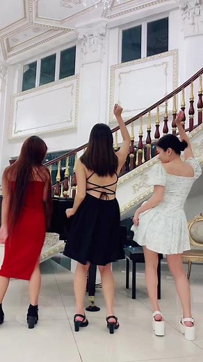 Chic Dance Performance in Elegant Ballroom Setting