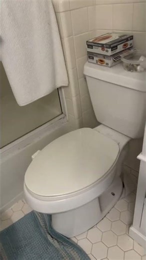 Two toilets facing each other in the same bathroom! 🚽 🤔