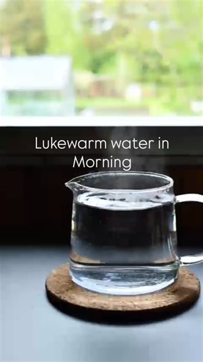 Nutrition with Arifa |Nutritionist |fitness Coach on Instagram: "Lukewarm water in the morning is more than just a habit; it’s a physiological reset for your body. As a nutritionist, I look at the biological impact of temperature on your system. When you wake up, your body is in a state of metabolic rest. Starting with water between 30°C and 40°C matching your internal core temperature triggers specific internal responses: The Clinical Facts: • Activation of Peristalsis: Lukewarm water stimulate