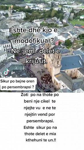 Urban Celebration Featuring a Large Crowd and Statue