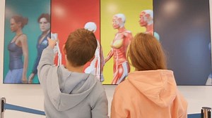 clip-1100364041-school-children-discovering-anatomy-human-body-science