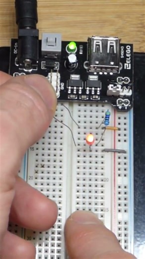 Two 470 Ohm Resistors Can Become 235 In Parallel With LED And 5V Breadboard Power Supply