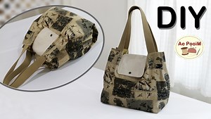 The simple way how to make a tote bag in 10 minutes. #diybags #diytotebag #easysewingtutorial #easysewingproject #sewingprojects Material: Outer / Cotton fabric - 50 x 40 cm (19 3/4" x 15 3/4") 2 pcs Lining / Cotton fabric - 50 x 40 cm (19 3/4" x 15 3/4") 2 pcs - 30 x 30 cm (11 3/4" x 11 3/4") 1 pc Cover / Canvas 12 Oz. - 16 x 16 cm (6 1/4" x 6 1/4") 2 pcs 4 cm (1 1/2”) wide, Webbing Strap - Length, 51 cm (20") 2 pcs Plastic Snap buttons | Ae PooiM