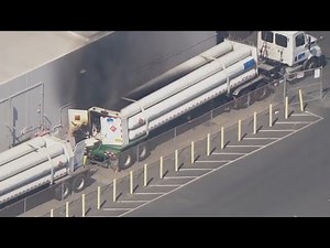 Truck carrying hydrogen tanks catches fire on Commerce freeway