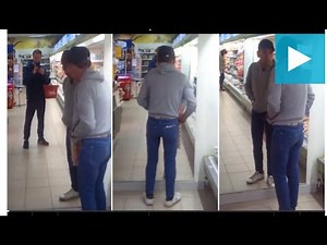 Drunk man tries to manoeuvre past his own reflection in mirror