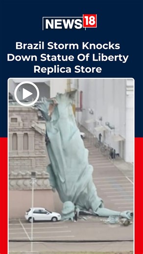 News18.com on Instagram: "#WATCH | A storm in Brazil topples a 40 meter Statue of Liberty replica at Havan store in Guaíba, shocking locals nearby. #BrazilStorm #StatueOfLibertyReplica #ExtremeWeather #ViralNews #BreakingNews"