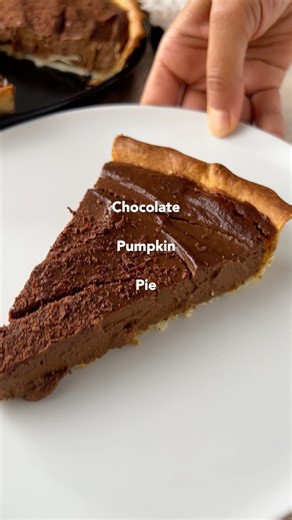 This decadent vegan chocolate pumpkin pie will surprise everyone this holiday season with its creamy texture and the combination of the spices of pumpkin pie with plant-based chocolate! It’s truly a winner – a pie that is perfect for any level cook, goes together easily, and bakes up perfectly delightful! 🧡Recipe: https://plantbasedonabudget.com/pumpkin-chocolate-pie/ #plantbasedonabudget #chocolatepumpkinpie #chocolatepie #pumpkinpie #pie #pierecipe #holidaydessert #thanksgivingdessert #christ