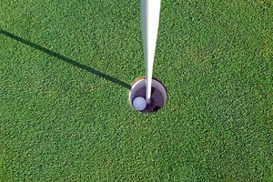 Rules Review: I thought my ball was lost and put another in play, then found my first in the hole(!) Which ball counts?