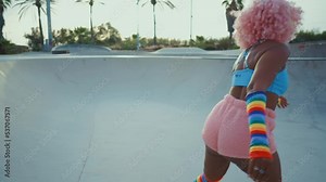 Beautiful woman skating with roller skates and having fun. Professional skater and dancer training in the morning